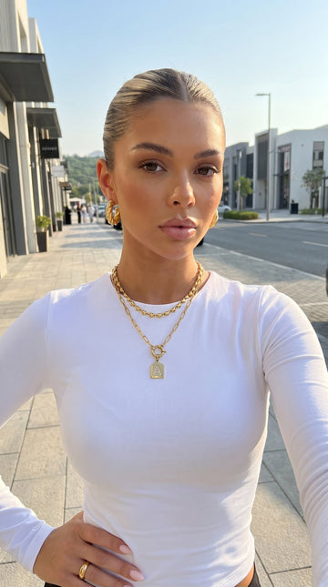 Pavé Letter Pendant Necklace worn by a customer